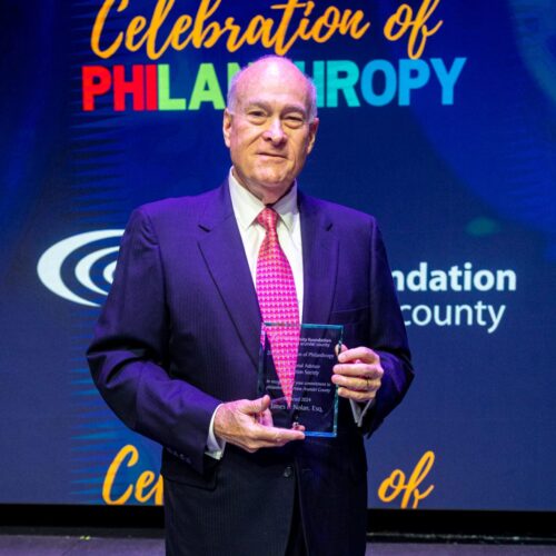 Jim Nolan being inducted to the Professional Advisor Recognition Society at the 2024 Celebration of Philanthropy