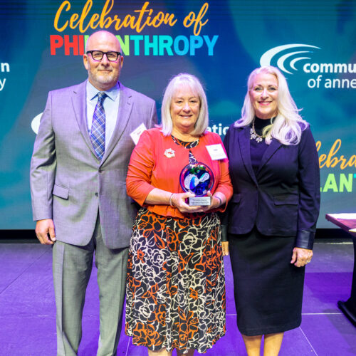 Lois Simpson accepts 2024 Celebration of Philanthropy - Legacy Award for Planned Giving, on behalf of the late Ethel Groh Webster Williams. Presented by CFAAC Board Member, Dan Mathias and CFAAC President and CEO Mary Spencer