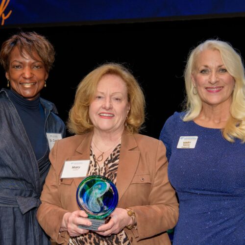 Mary McKeil accepts 2023 Celebration of Philanthropy - Legacy Award for Planned Giving, on behalf of the late Dr. Michael Kurtz. Presented by CFAAC Board Member, Dr. Coryse Brathwaite and CFAAC President and CEO Mary Spencer