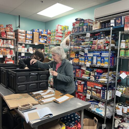 Volunteers working in a food pantry