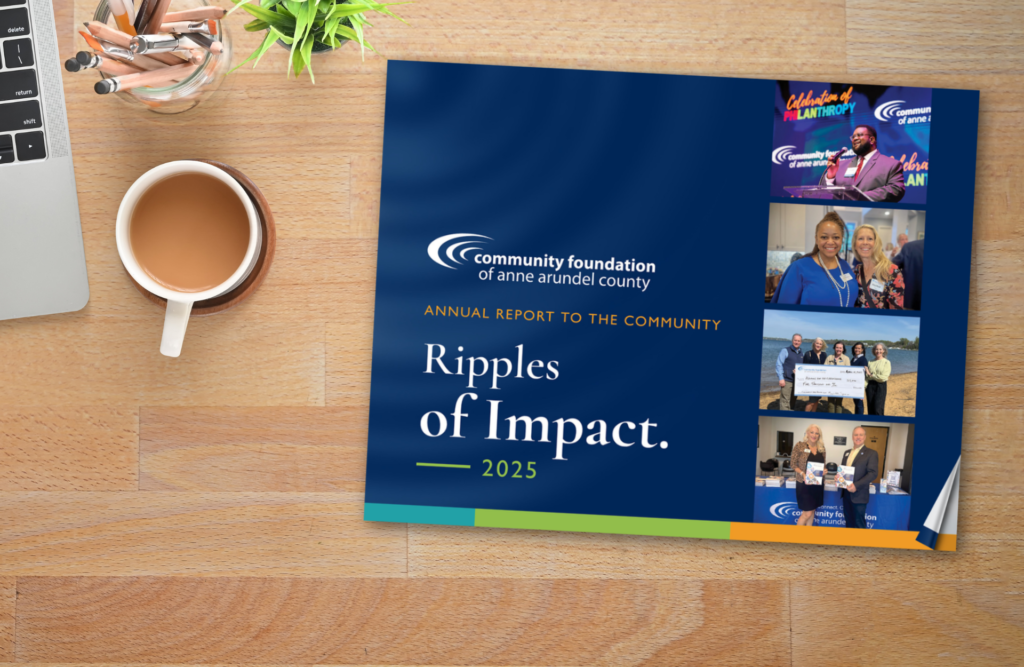 Cover of the 2025 CFAAC Annual Report on a desk