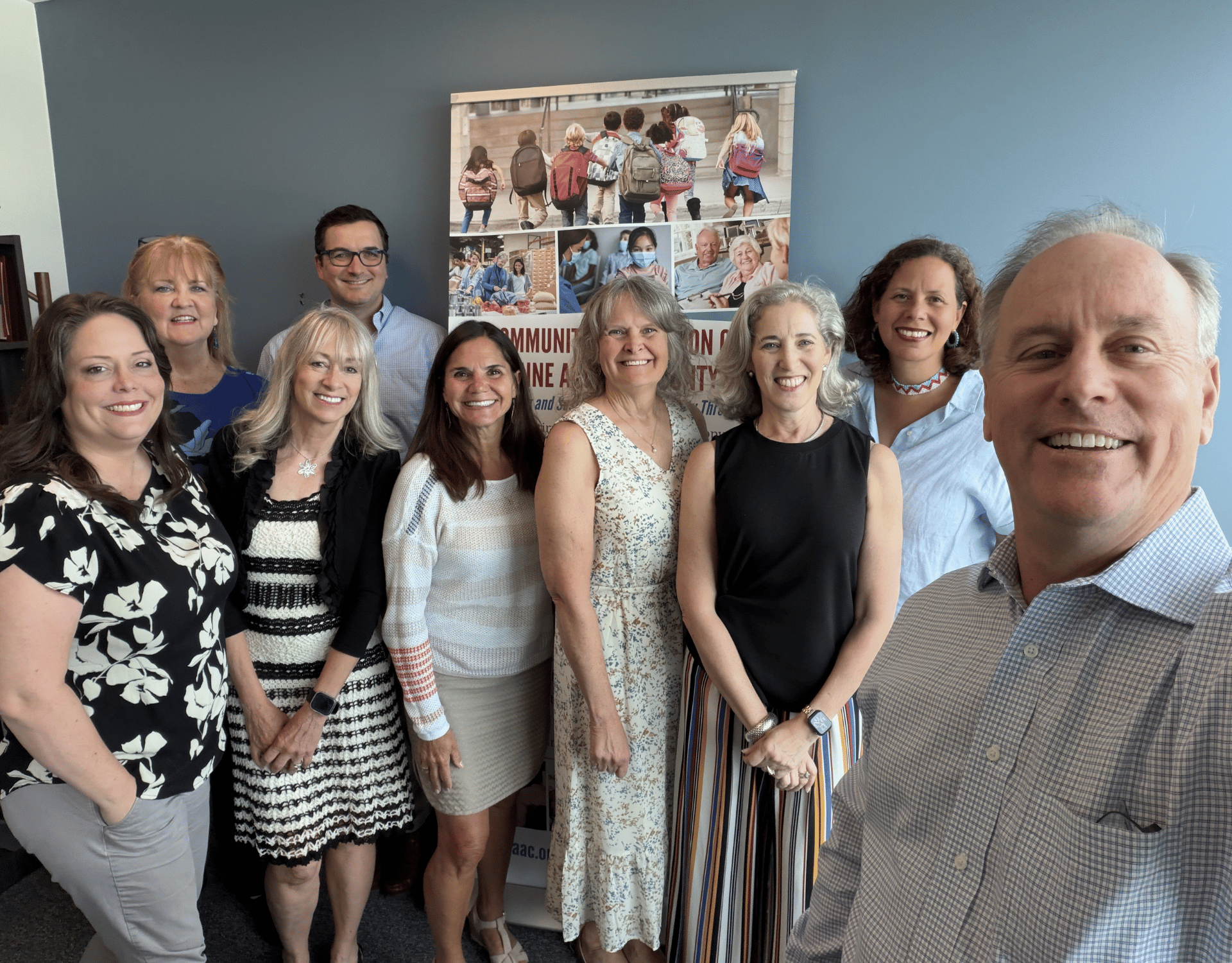 Left to Right: Ashley Robison St. Clair, Camille Kalb, Renee Zemanski, Thomas Perkins, Jennifer Lagrotteria, Kathey Luthcke, Rosalind Calvin, Jennifer Bowser, and John Rodenhausen posing for a selfie.